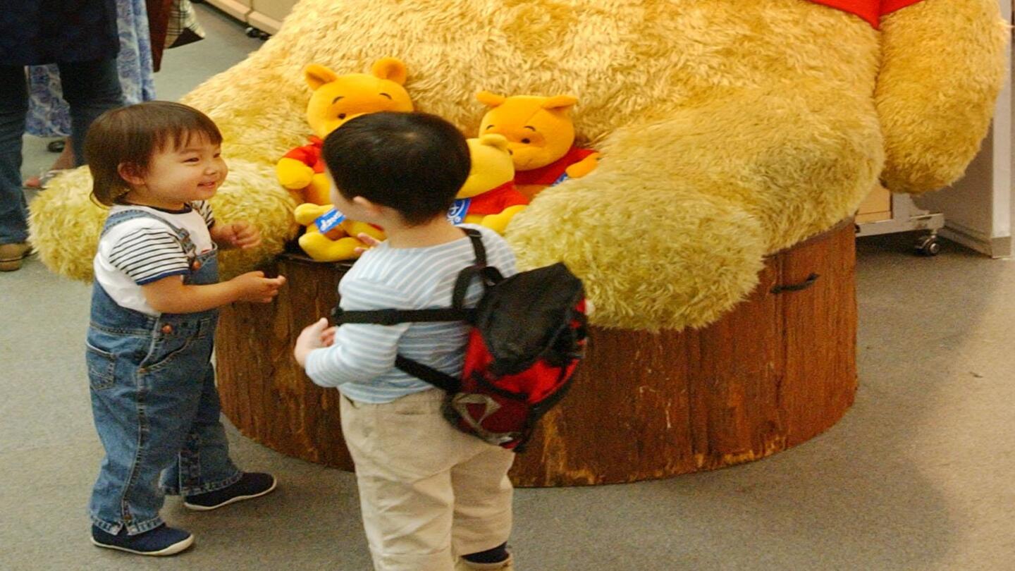 Peluche winnie the pooh pequeño top